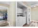 Bright laundry room features modern washer and dryer and plenty of storage at 641 Saratoga Dr, Clover, SC 29710