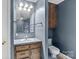 Cozy bathroom featuring vanity, toilet and bathtub with showerhead at 800 Woodlawn St, Belmont, NC 28012