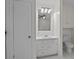 Bathroom featuring vanity, toilet, mirror, light fixture, and door at 800 Woodlawn St, Belmont, NC 28012