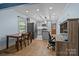 Eat in kitchen area featuring modern stainless steel appliances and ample cabinet space for efficient cooking and organization at 800 Woodlawn St, Belmont, NC 28012
