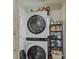 The laundry area has a front loading washer and dryer at 800 Woodlawn St, Belmont, NC 28012