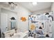Cute bathroom with a dinosaur shower curtain and matching dinosaur decor at 835 Jet St, Kannapolis, NC 28081