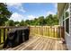Deck with railings, great for outdoor dining and entertaining overlooking a backyard at 835 Jet St, Kannapolis, NC 28081