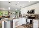 Bright kitchen featuring granite countertops, stainless appliances and ample lighting at 835 Jet St, Kannapolis, NC 28081
