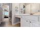 Bright bathroom with double vanity, access to shower, and an open door to the bedroom at 8605 Soaring Eagle Ln, Waxhaw, NC 28173