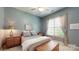 Comfortable bedroom with ample natural light and neutral decor at 8605 Soaring Eagle Ln, Waxhaw, NC 28173