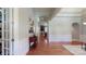 Elegant entryway featuring hardwood floors, arched doorways, and decorative trim at 8605 Soaring Eagle Ln, Waxhaw, NC 28173