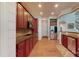 Well-equipped kitchen with cherry cabinets and stainless steel appliances at 8605 Soaring Eagle Ln, Waxhaw, NC 28173