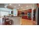 Spacious kitchen features a granite countertop bar and stainless steel appliances at 8605 Soaring Eagle Ln, Waxhaw, NC 28173