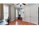 Cozy study with built-in shelving, a desk, and natural light from a window at 8605 Soaring Eagle Ln, Waxhaw, NC 28173