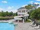 Community pool features a large waterslide and lounging chairs around the deck at 8605 Soaring Eagle Ln, Waxhaw, NC 28173
