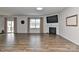 Spacious living room features a fireplace, hardwood floors, and plenty of natural light at 9505 Cotswood Pl, Gastonia, NC 28056