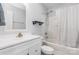 Bright bathroom featuring vanity, toilet, and shower-tub combo with modern fixtures at 9593 Indian Beech Nw Ave, Concord, NC 28027