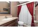 Bathroom featuring a wood vanity, mirror, and shower with curtain at 9593 Indian Beech Nw Ave, Concord, NC 28027