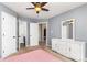 Bright, open bedroom with adjacent doorways to other areas of the home at 9593 Indian Beech Nw Ave, Concord, NC 28027