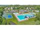 Resort-style community pool, playground, and tennis courts, perfect for active living at 9593 Indian Beech Nw Ave, Concord, NC 28027