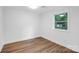 Bright bedroom with hardwood floors, fresh paint, and lots of natural light at 9826 Meringue Pl # 15, Charlotte, NC 28270