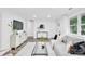 Inviting living room with neutral tones, plush sofa and bright natural light at 9826 Meringue Pl # 15, Charlotte, NC 28270