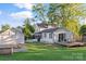 Expansive backyard featuring a deck with patio furniture, perfect for outdoor entertaining at 1020 12Th Nw Ave, Hickory, NC 28601