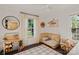 Bright bedroom featuring hardwood floors, natural light, and stylish décor at 1020 12Th Nw Ave, Hickory, NC 28601