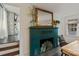Elegant fireplace with a decorative mirror, mantel, and hearth, in a stylish room at 1020 12Th Nw Ave, Hickory, NC 28601