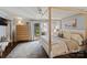 Cozy main bedroom with natural light, a comfortable bed, and access to the backyard at 1020 12Th Nw Ave, Hickory, NC 28601