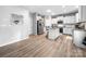 This light bright kitchen features an island, stainless steel appliances and ample counter space at 10426 Kempsford Dr, Charlotte, NC 28262