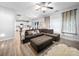 This comfortable living room flows into the kitchen and dining area, perfect for modern living and entertaining at 10426 Kempsford Dr, Charlotte, NC 28262