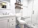 Bright bathroom with tiled walk-in shower, and white vanity offering a modern and clean aesthetic at 1051 14Th Avenue Nw Dr, Hickory, NC 28601