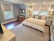 Tranquil bedroom with soft lighting, plush bedding, and hardwood floors at 1051 14Th Avenue Nw Dr, Hickory, NC 28601