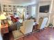 Cozy living room featuring built-in shelving, a fireplace, and comfortable seating at 1051 14Th Avenue Nw Dr, Hickory, NC 28601