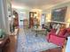 Warm living room with fireplace, elegant furnishings, and natural light at 1051 14Th Avenue Nw Dr, Hickory, NC 28601