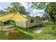 Backyard features the house and a covered carport at 1075 Parkview Dr, Gastonia, NC 28054