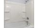Bathroom featuring a shower and bathtub with shelves at 1075 Parkview Dr, Gastonia, NC 28054