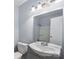 Bathroom boasts a vanity, mirror, and toilet at 1075 Parkview Dr, Gastonia, NC 28054