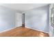 Bedroom featuring hardwood floors, neutral paint and closet at 1075 Parkview Dr, Gastonia, NC 28054