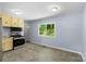 Kitchen area with stainless steel appliances and view from window at 1075 Parkview Dr, Gastonia, NC 28054