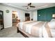 Comfortable bedroom featuring a wooden bed frame with ensuite bathroom at 11951 Old Statesville Rd, Huntersville, NC 28078