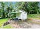 Storage shed with covered area in the backyard of the property at 1211 11Th Nw St, Hickory, NC 28601