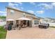 Large outdoor patio featuring an in-ground hot tub, gazebo, and plenty of room for outdoor entertaining at 12822 Plumleaf Dr, Charlotte, NC 28213