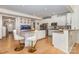 Spacious kitchen with granite countertops, island with seating, and stainless appliances at 12822 Plumleaf Dr, Charlotte, NC 28213