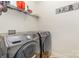 Laundry room with stainless steel washer and dryer set at 12822 Plumleaf Dr, Charlotte, NC 28213