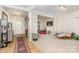 Inviting living space with hardwood floors, neutral walls, and abundant natural light at 12822 Plumleaf Dr, Charlotte, NC 28213