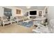 Sophisticated living area with stylish furniture, a sleek fireplace, and tasteful decor at 12822 Plumleaf Dr, Charlotte, NC 28213
