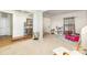 Bright living area with hardwood and carpet floors, perfect for entertaining at 12822 Plumleaf Dr, Charlotte, NC 28213