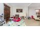 Spacious playroom bathed in natural light, perfect for activities and play at 12822 Plumleaf Dr, Charlotte, NC 28213