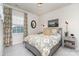 Cozy bedroom with neutral tones and great natural light at 13338 Blanton Dr, Huntersville, NC 28078