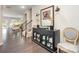 Inviting entryway featuring dark hardwood floors, a buffet table and stairway at 13338 Blanton Dr, Huntersville, NC 28078