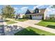 A well-maintained house featuring landscaped lawns and a concrete driveway in a suburban neighborhood at 13338 Blanton Dr, Huntersville, NC 28078