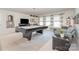 Spacious game room with pool table and comfortable seating at 13338 Blanton Dr, Huntersville, NC 28078